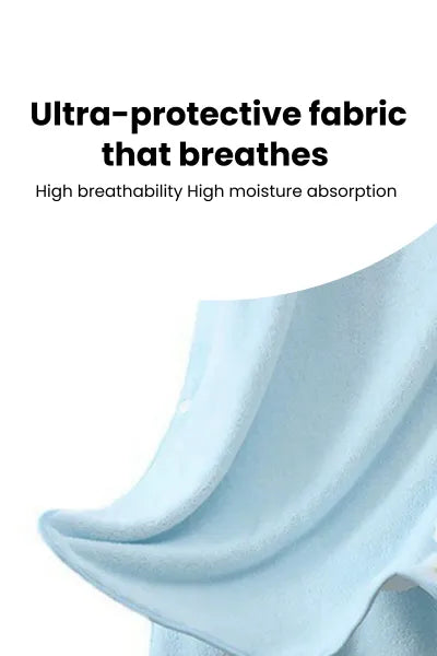 A close-up shot of a soft, light blue fabric, described as "Ultra-protective fabric that breathes" with "High breathability" and "High moisture absorption.