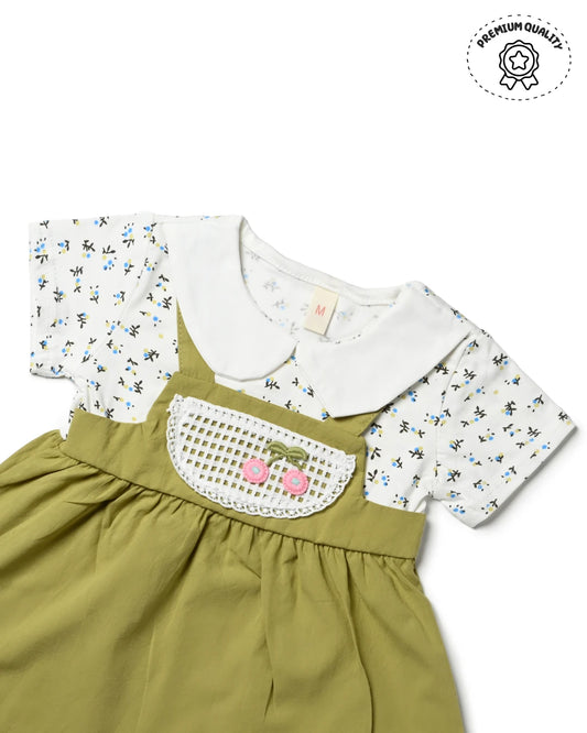 A sweet green dress with a white top and teddy bear, ideal for girls shopping