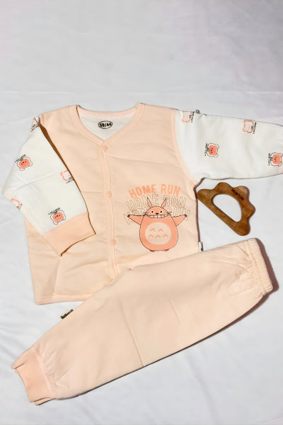 Children's pajama set with cartoon design on a light gray background