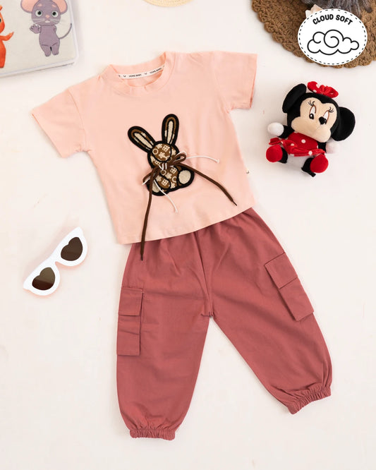 Girls kids clothing set with bunny print top and pink cargo pants. Girls fashion, trending clothes for girls
