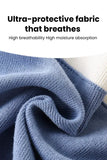 A close-up shot of a soft, textured blue fabric, described as "Ultra-protective fabric that breathes" with "High breathability" and "High moisture absorption."