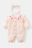 A charming light pink baby romper with a scalloped strawberry collar and matching headband, a trendy item in girls fashion and suitable as new born cloths for a baby.

