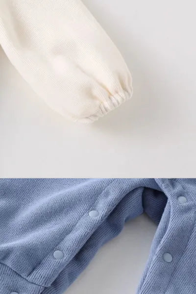 Detailed view of a baby romper showcasing its practical buckle design and appealing shape, a comfortable option for a baby and a type of new born cloths.
