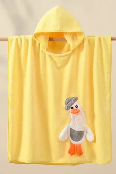Yellow hooded towel for a child with a duck design.
