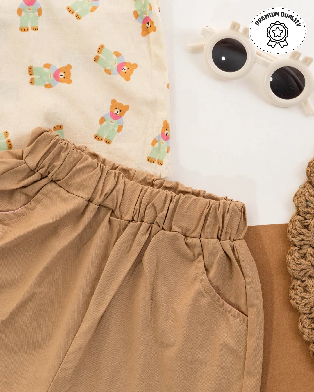 Kids dress for boys: beige shorts paired with a colorful printed shirt. Boys dress, boys new dress