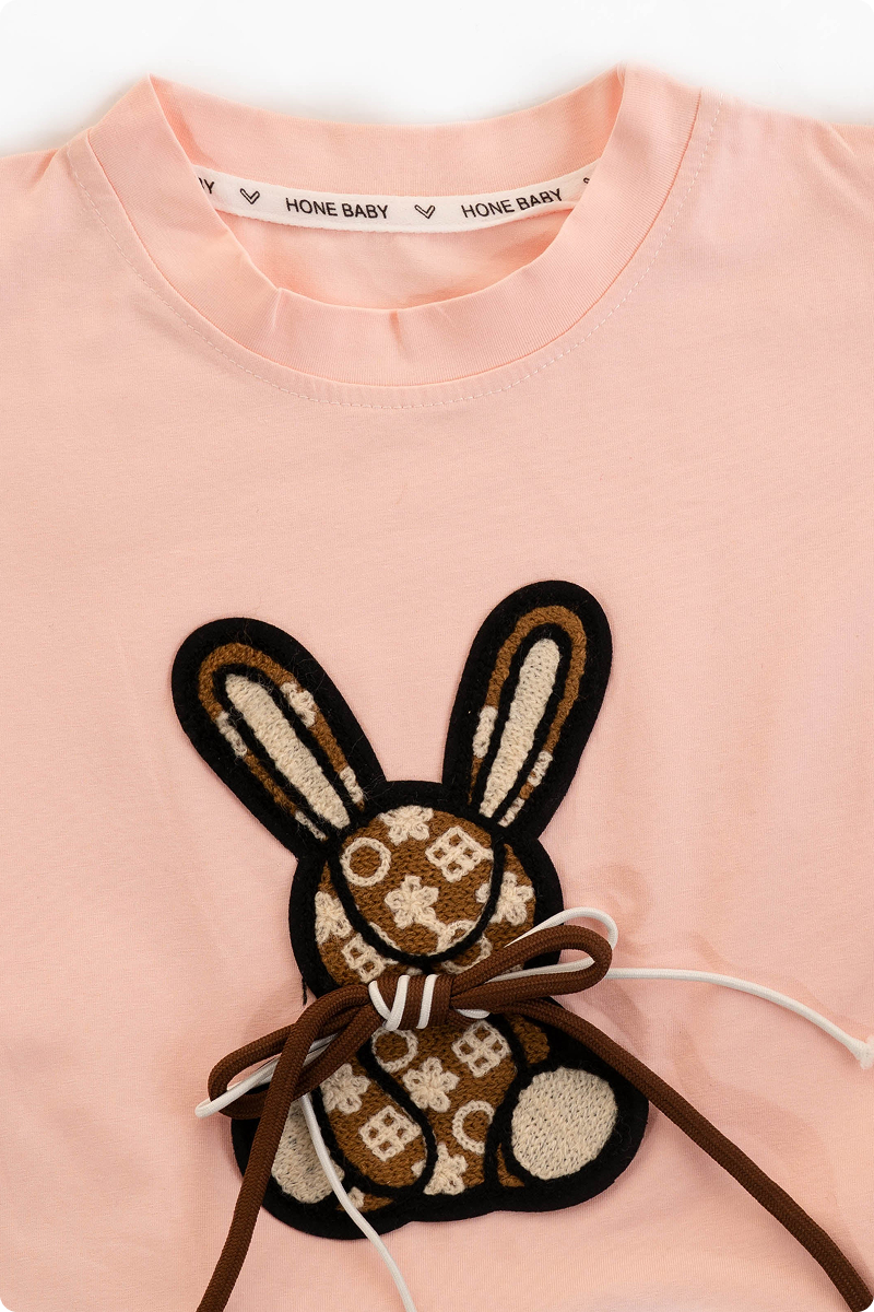 Adorable kids clothing set for girls with a bunny-themed t-shirt and pink pants. Girls fashion, girls wear, trending clothes for girls.
