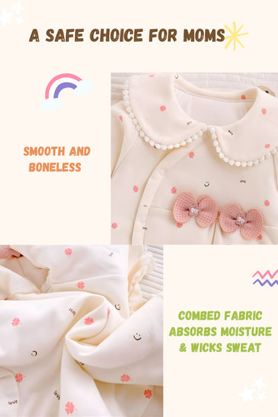 Baby outfit with decorative bows and text about safety for moms.