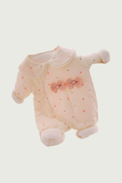 Baby romper with floral design on a light gray background