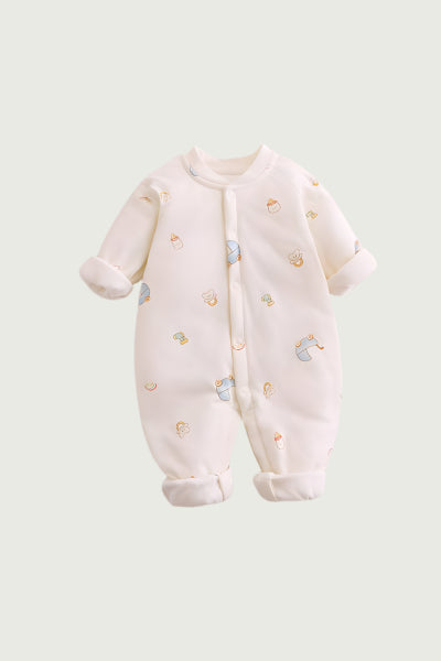 Baby onesie with small patterns on a light gray background