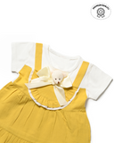 This kids dress for girls features a small teddy bear detail, perfect for girls shopping.
